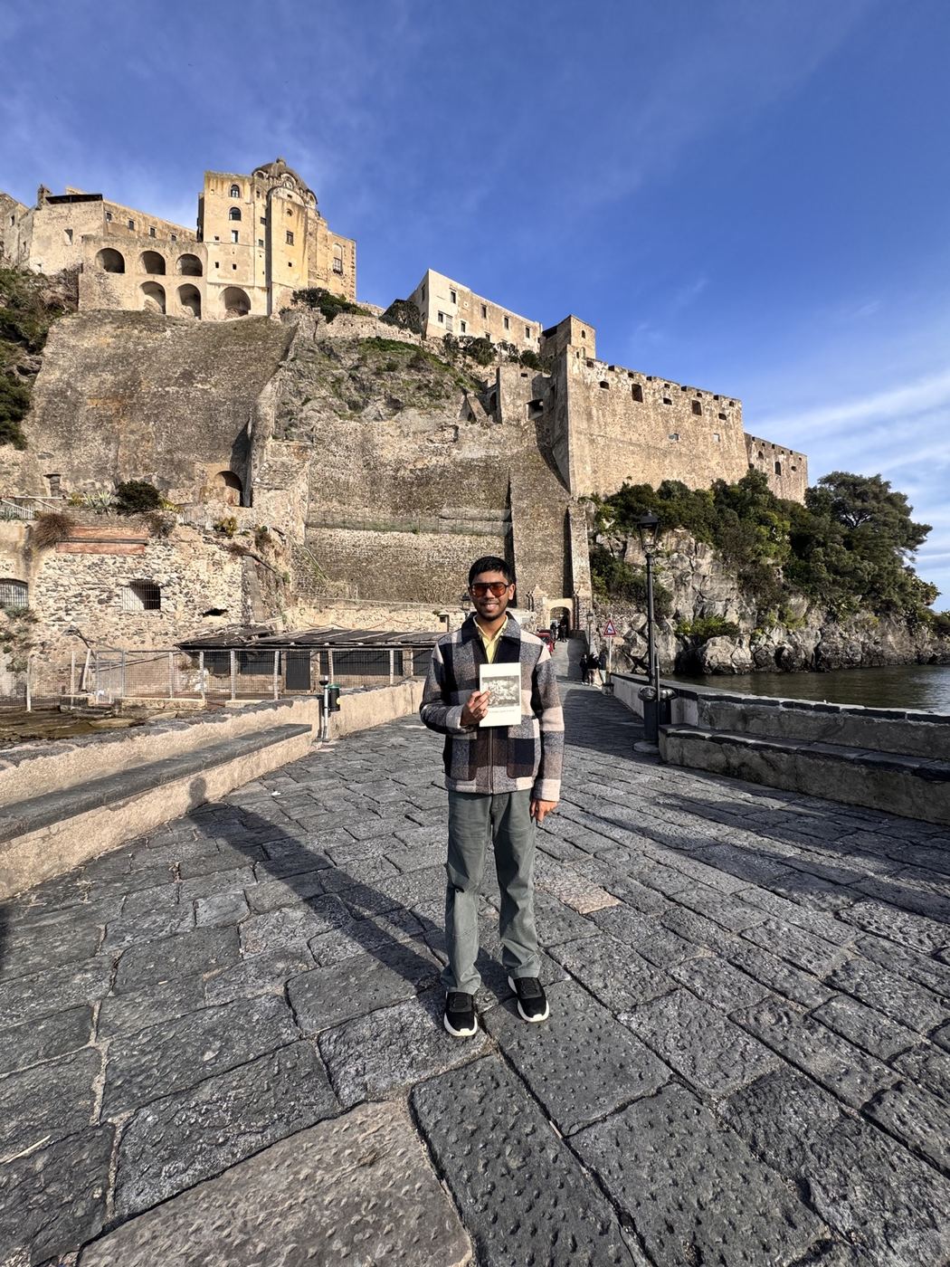 Standing outside Aragonese Castle during my visit